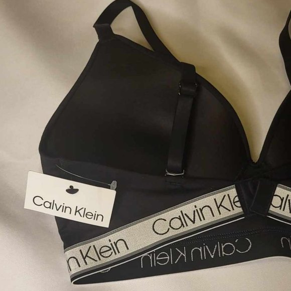 Black Calvin Klein Sport Bra. Gift with a purchase of $75 or more. - Picture 3 of 4